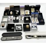 A collection of boxed fashion watches including Bespoke Time, Anne Klein etc.