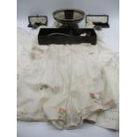 A small collection of antique Christening gowns etc. along with a small quantity of silver plated