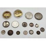 A small collection of mainly silver coinage including an 1896 Morgan Dollar, 1968 Mexican 25 Ley