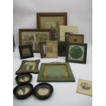 A collection of turn of the century photograph frames and photographs, some local interest