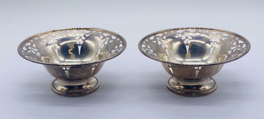 A pair of hallmarked silver dishes with pierced decoration