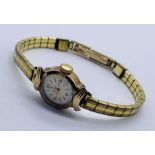 A 9ct gold ladies 'Roidor' watch with replacement strap
