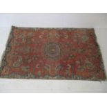 An Eastern red ground rug. 153cm x 94cm