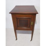 An Edwardian inlaid mahogany bedside cabinet.