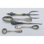 A silver plated muffin fork, three hallmarked Exeter silver spoons and silver handed button hook