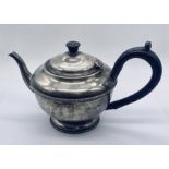 A hallmarked silver tea pot, Birmingham 1932- total weight 404.5g (including handle etc.)