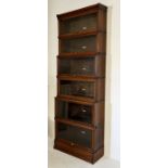 A Globe Wernicke sectional waterfall bookcase with six glazed sections on base - overall height