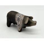 A small Raku pottery saddleback pig - 8cm long