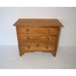 A pine chest of three drawers, length 92cm, height 80cm.