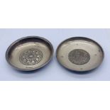 Two hallmarked silver dishes, one with a central plaque depicting a hunting scene, the other