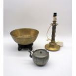 A brass singing bowl on stand, with character mark to base, along with an Oriental pewter teapot,