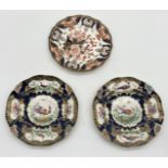 Three cabinet plates including a Royal Crown Derby Imari "Kings" pattern plate and two Chelsea