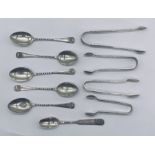 A collection of hallmarked silver coffee spoons, sugar tongs etc, total weight 119.2g