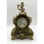 A French ormolu gilt and onyx clock with seated cherub finial - dial marked Vamut Foussat Jargeau,