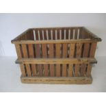 A large industrial wooden slatted crate with drop down front from Axminster Carpet factory