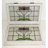 A pair of stained glass windows with painted wooden surround 69.5cm x 46.5cm