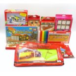 Eight Britains boxed farm buildings and accessories, comprising of Riding Stable (4730), Sheep