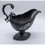 A hallmarked silver sauce/gravy boat on shaped foot, London 1771, weight 492.1g
