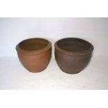 A pair of large earthenware glazed terracotta garden pots, diameter 50cm, height 40cm.