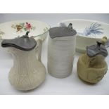 A Wedgwood of Etruria bowl, along with three relief moulded salt glazed jugs, one Copeland and a