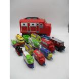 A collection of Chuggington trains including carry case