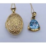 A 9ct gold locket on chain along with an aquamarine coloured pendant (marked 10K) on 10k chain