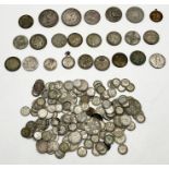 A collection of mainly silver coinage including two Morgan dollars, 3d's, florins etc.