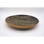 A studio pottery slipware dish, from the estate of Michael Morgan, diameter 33cm.
