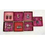 A collection of Butler & Wilson cat themed brooches and rings