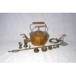 A copper kettle, along with a toasting fork, various weights etc.