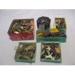 A collection of lead figures including animals, soldiers, carts, cowboys etc