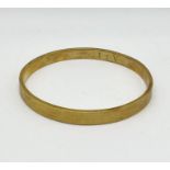 A large 9ct gold slave bangle, weight 15.5g