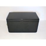 A black painted wooden storage trunk, length 63cm, height 35cm.