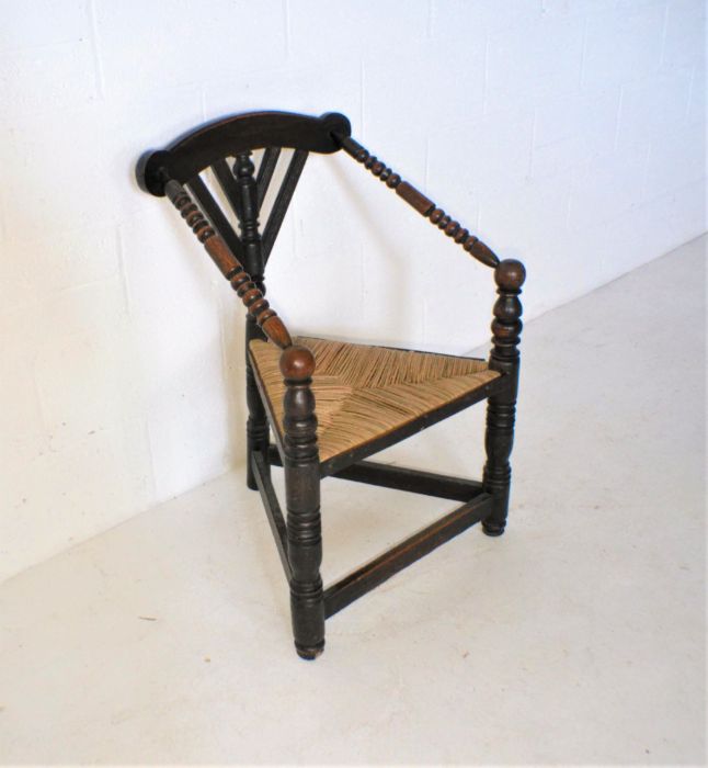 A Liberty style oak corner chair with rush seat. - Image 3 of 5