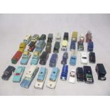 A collection of various playworn die-cast vehicles mainly of emergency vehicles and advertising vans