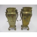 A pair of Oriental bronze vases engraved with bamboo etc.