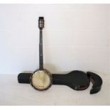 A five string banjo, marked 'A Braddon, Maker', along with a case, case A/F.