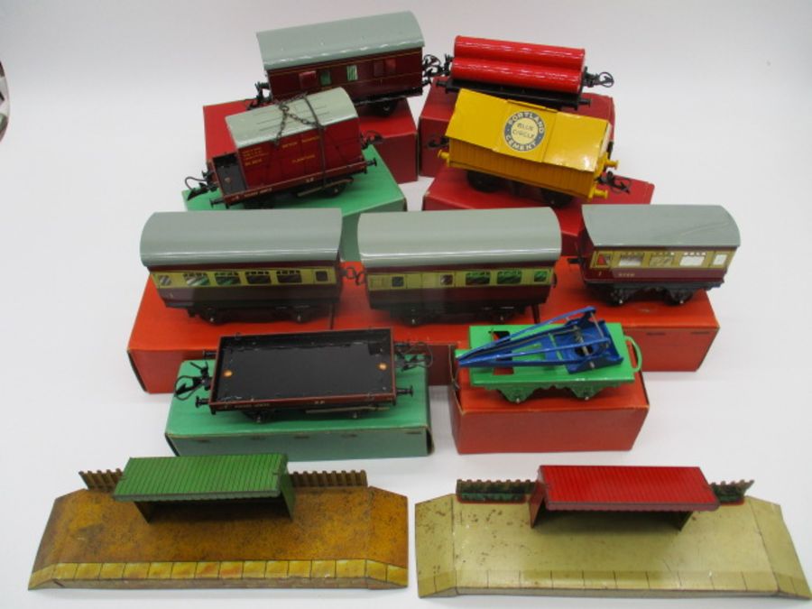 A collection of nine boxed Hornby Trains O gauge rolling stock including three coaches (42117,