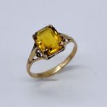 A 9ct gold ring set with citrine