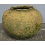 A large, weathered terracotta urn. Approx height 40cm