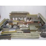 A large collection of model railway buildings and accessories including stations, signal boxes,