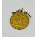 A 1914 half sovereign with 9ct part mount