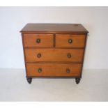 A Victorian mahogany chest of four drawers, raised on turned feet, length 92cm, height 92cm.