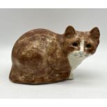 A ginger Winstanley pottery cat signed to base and numbered 40