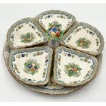 A Mason's Ironstone hors d'oeuvres centrepiece with six dishes in the Chelsea pattern