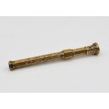An unmarked (tested 9ct gold) hexagonal propelling pencil dated to 1853, total weight 9.3g