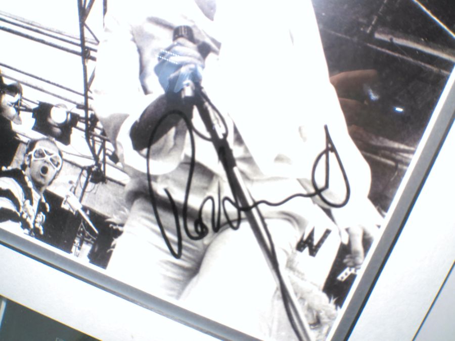 Three photographs of Rod Stewart in a single frame, the centre photo signed with certificate of - Image 4 of 6