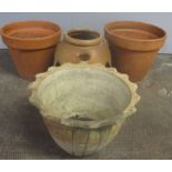 Two large terracotta pots (heights 33cm and 35cm) a glazed strawberry planter, plus another large