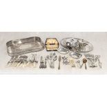 A collection of silver plated items including two large trays, mother of pearl style cutlery, four