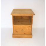 A pine bedside cabinet with one drawer.